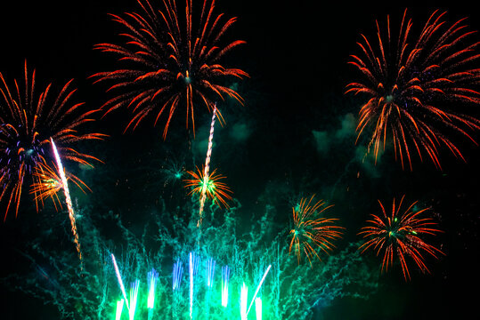 vibrant Colorful Firework celebrate anniversary happy new year 2027, 4th of july holiday festival. colorful firework night time to celebrate national holiday. countdown new year party 2026 background