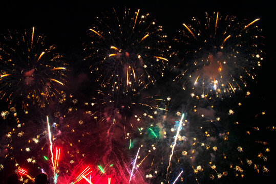 vibrant Colorful Firework celebrate anniversary happy new year 2027, 4th of july holiday festival. colorful firework night time to celebrate national holiday. countdown new year party 2026 background