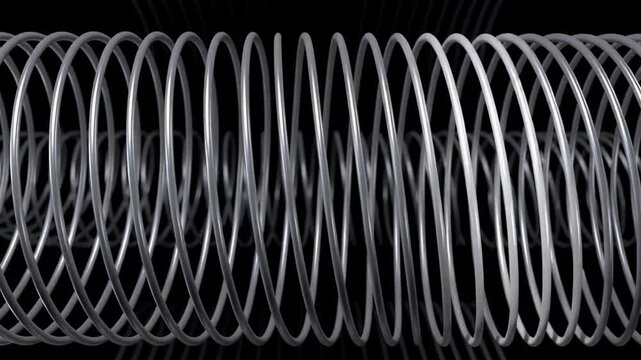 Close-up of a coiled metallic spring