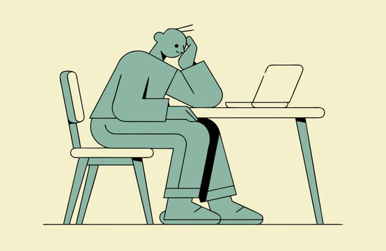 Mental wellbeing concept with tired woman sitting at desk and looking at laptop, illustrating quiet end-of-day fatigue, stress, exhaustion and emotional burnout