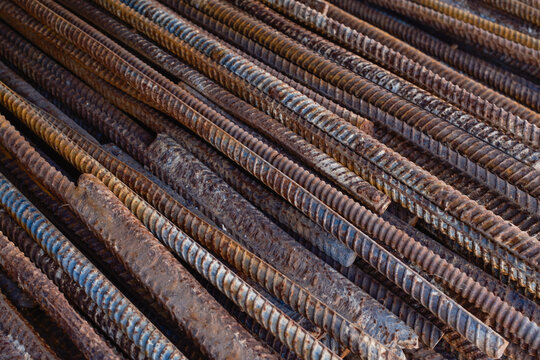 Rusty steel reinforcement rebars diagonal background