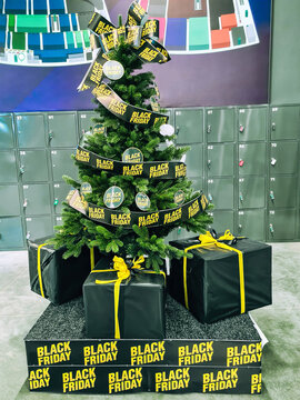 Bizarre Black Friday Christmas tree, gift boxes, storage lockers in shopping mall