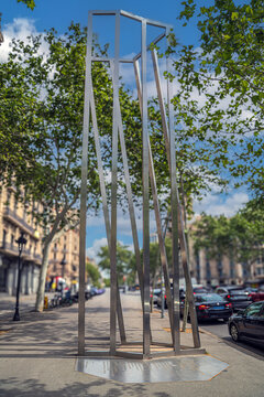Barcelona, Spain - April 15, 2024: Encaix monument on Gran Via de les Corts Catalanes, honoring victims of the 1938 Spanish Civil War bombings at the site where a bomb fell.