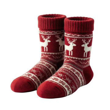 Red wool socks with reindeer and snowflake pattern, isolated on transparent background