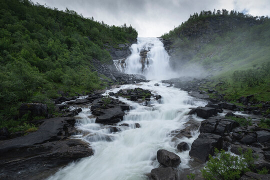 Flowing water of Valnesfossen  Valnes Waterfall, Nordland, Norway