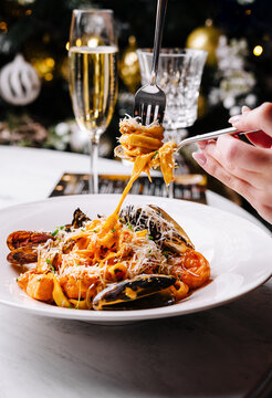 Gourmet seafood pasta with champagne