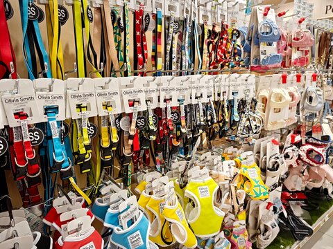 A wide variety of pet products including clothing, rainwear, leashes, harnesses, toys and accessories