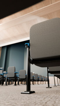 Conference chairs arranged in rows inside a modern meeting room