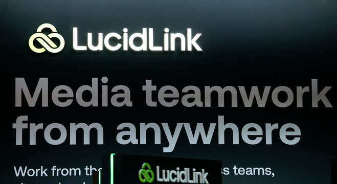 Amsterdam, Netherlands - September 12, 2026: LucidLink media collaboration software website showing teamwork from anywhere message on a dark presentation screen