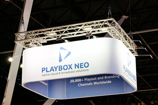 Amsterdam, Netherlands - September 12, 2026: PlayBox Neo hanging exhibition sign with native cloud and broadcast solutions branding at IBC media technology trade show