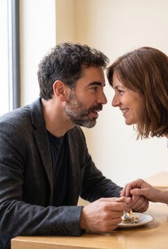 Couple enjoying an intimate conversation at a restaurant