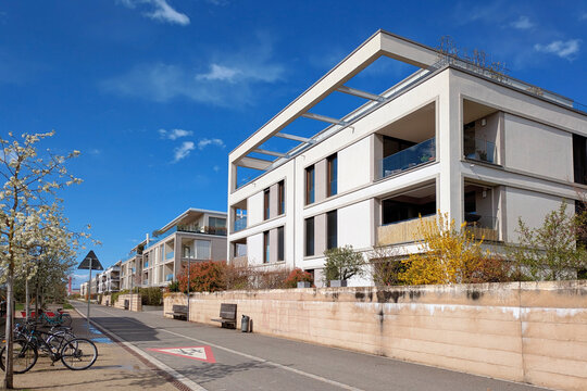 Heidelberg, Germany - March 19th 2026: Modern white cubic residential buildings in Heidelberg Bahnstadt district. Sustainable urban development and passive house architecture