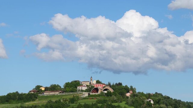 Panoramic View of Rural Hilltop Village Under Blue Sky in Piedmont
