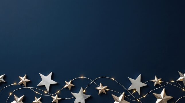 Festive string lights with star shapes on dark background