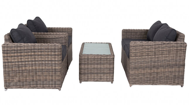 Wicker patio furniture set featuring dark grey cushions
