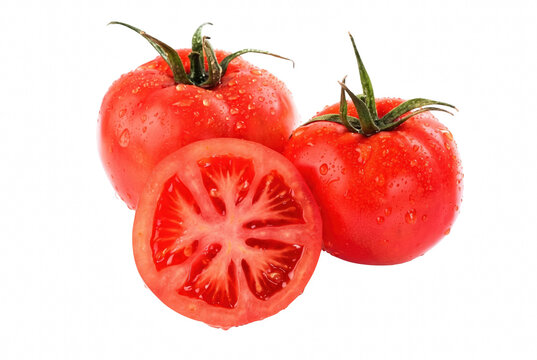 Red tomatoes with water droplets and fresh slice