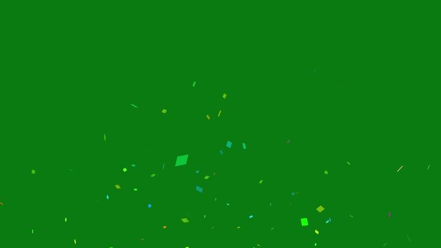 Bright confetti particles floating downward on green screen backdrop party paper festival event