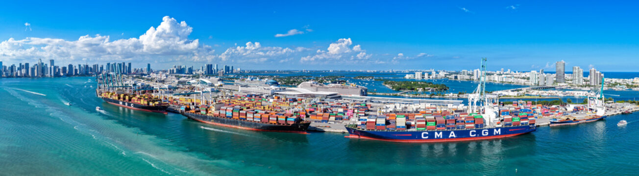 Miami, Florida, USA - November 08, 2025: Miami cargo port panorama. Panoramic port in Florida. Miami port with cargo ship MSC and CMA CGM. Aerial panoramic view. Cargo ship docked in port of Miami