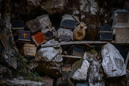 Traditional Burial Tombs Arranged Along Rock Cliff in Tana Toraja Indonesia