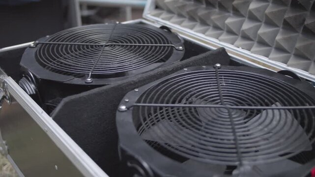Stage effects fans packed in a flight case, ready for installation