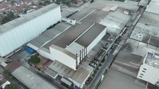 Aerial view of large industrial infrastructure, factories, and manufacturing facilities in West Java