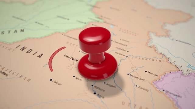 India map with a red push pin landing near New Delhi as a circle draws around the location