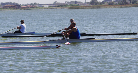 Four senior caucasian men and women rowing boat on a river © WavebreakMediaMicro