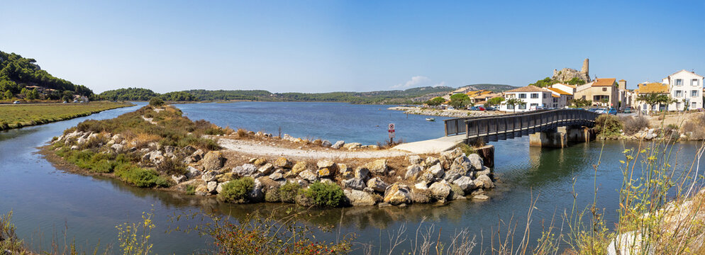 Panoramic view of the Gruissan Lagoon (Aude, France) and the old town with its Tour Barberousse castle, on a sunny day in summer 