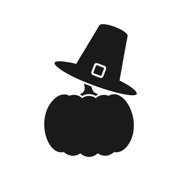 Black silhouette vector of a autumn pumpkin wearing a pilgrim hat with a buckle