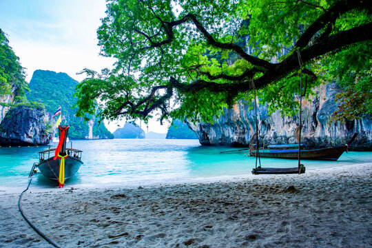 tropical beach with boats