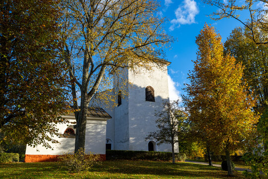 Nykoping, Sweden Autumn foliage on a sunny day and the Svarta Church.