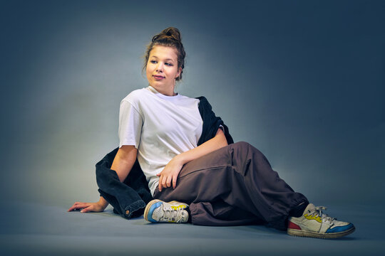 Studio portrait of a girl in casual clothing
