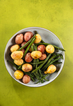 New Potatoes and Green Beans in a Rustic Table Setting
