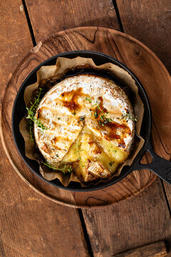 Baked Brie Cheese in a Skillet with Fresh Thyme