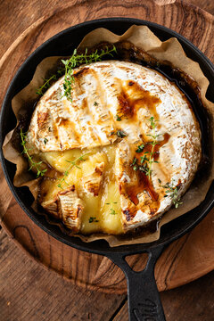 Baked Brie Cheese in a Skillet with Fresh Thyme