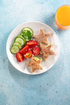 Healthy vegetarian lunch for little kids. Kid meal. Vegetable and fruit served as a stars