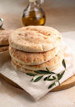 pita bread with olives and olive oil