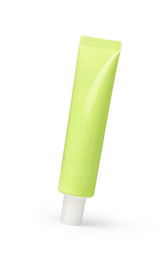 Blank lime green cosmetic tube with white cap on white background