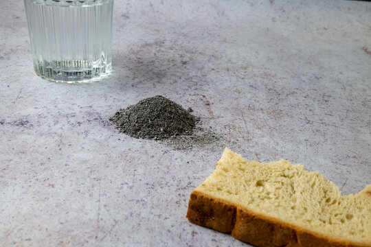 Religious Fasting Symbolized by Bread Water and Ashes