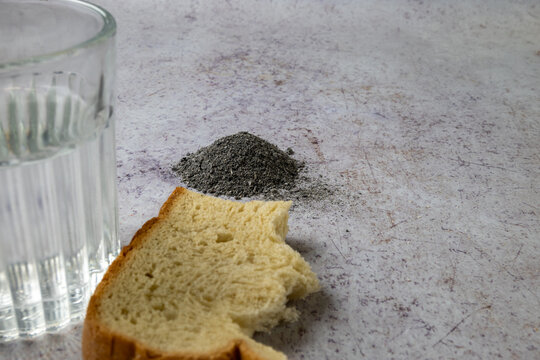 Religious Fasting Symbolized by Bread Water and Ashes