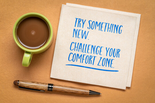 Try something new. Challenge your comfort zone. Motivational quote about lifelong learning, personal growth, and embracing new challenges.