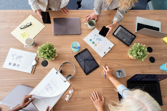 Business professionals collaborating in a modern office meeting