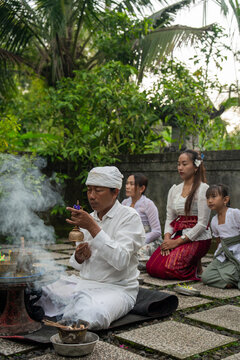 Traditional Ritual Ceremony in Bali With Participants and Offerings