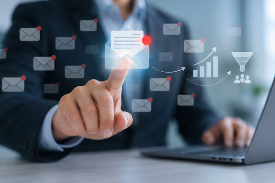 Business professional tapping glowing email icon above laptop in office opening messages email marketing concept for boosting open rates and conversion growth