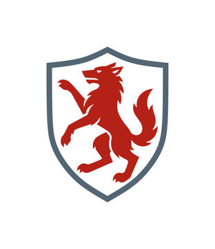 stylized logo of wolf in shield frame (heraldic design)