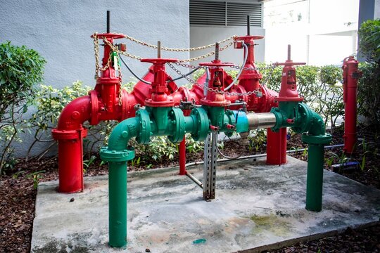 Industrial backflow preventer valves and red fire department pipes