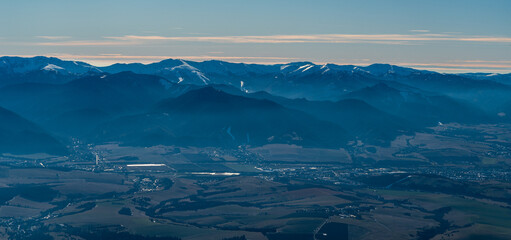 Liptovska kotlina and Low Tatras mountains from hiking trail between Ziarska dolina and Baranec peak in Western Tatras mountains in Slovakia © honza28683