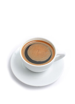 Vertical top view close up of a white porcelain coffee cup filled isolated on a solid white background