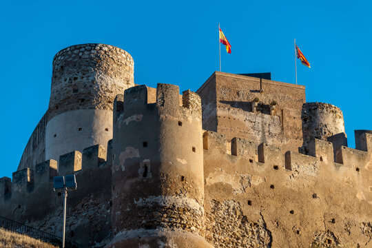 View of the medieval castle at Biar, Alicante, Spain, situated atop a hill