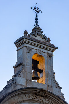 A close-up of the bell tower at the Sanctuary of Our Lady of Grace in Biar, Alicante (Spain), at dawn